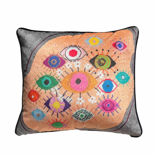 pillow covered in fanciful, brightly-colored, whimsical, fanciful eyes