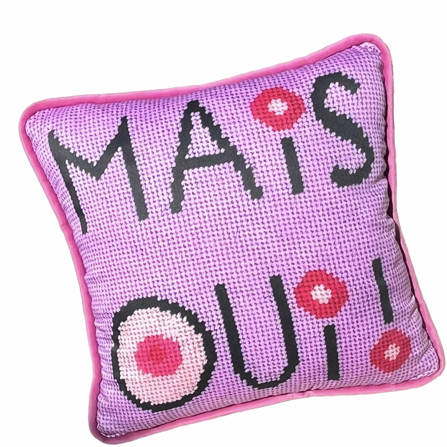 mais oui black stacked text with I dot and O that have cream colored centers with pink circles. Lavender pink background