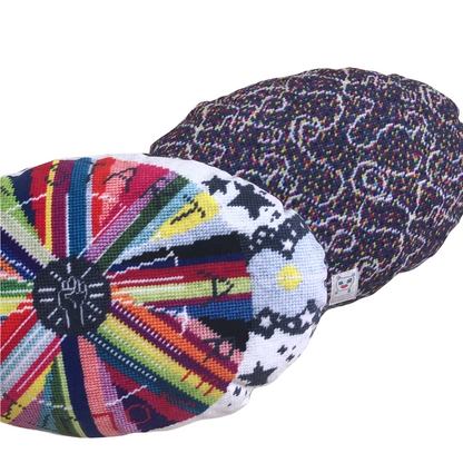 pillow center is dark gray with white fist pump, rainbow circle radiates out with GONNA START A REVOLUTION, cloud and stars border