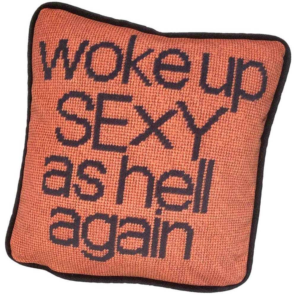 woke up sexy as hell in black, centered on pillow with copper background