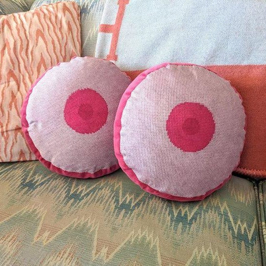 baby pink round pillow with hot pink small center