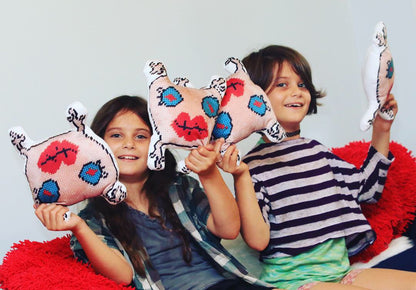 sweet monster sculpted plush pillow with big blue eyes and lips
