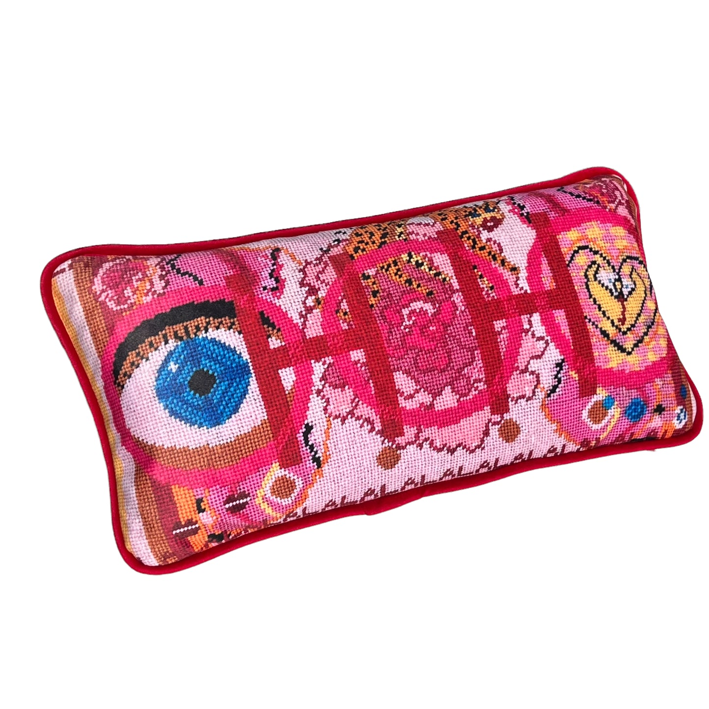 pink based velvet pillow with blue eye, cheetah, lips, snakes